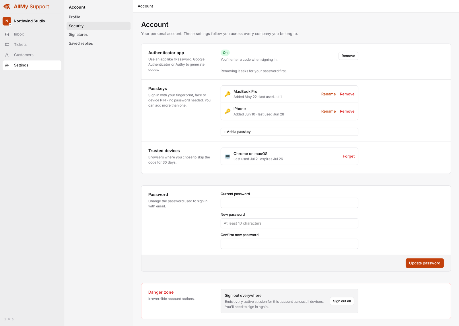 The account security settings in AllMy Support: an authenticator app switched on, two registered passkeys, and a trusted device listed.