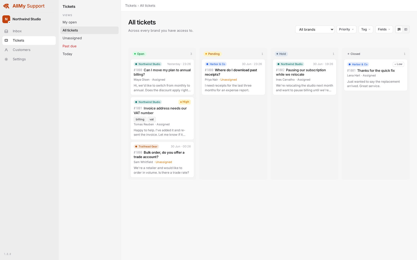 The AllMy Support inbox with tickets from three brands sorted into Open, Pending, and Closed columns, each ticket showing its brand and who it is assigned to.